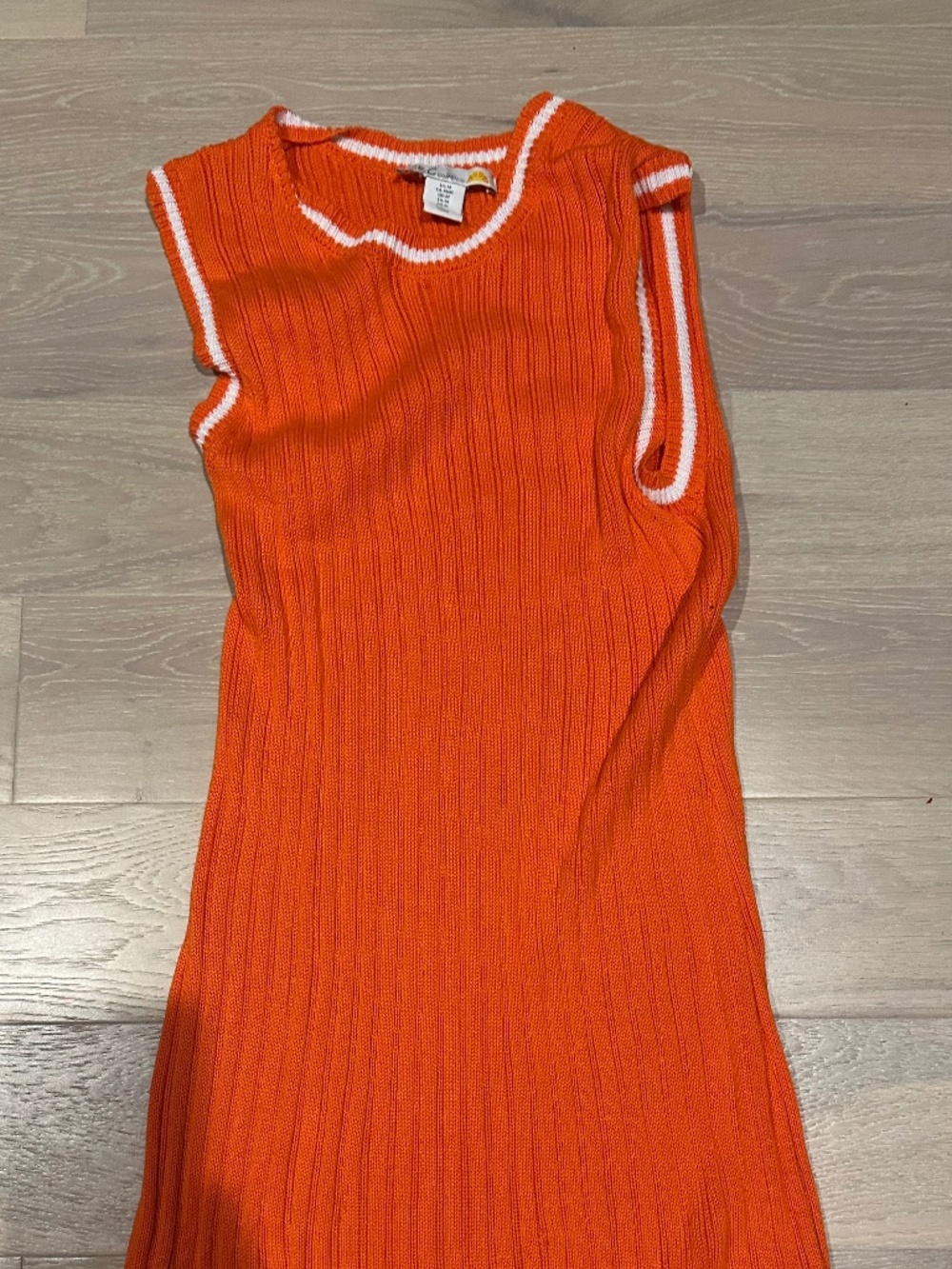 orange mini dress with white trim